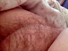 Horny amateur MILF rubs her hairy pussy in homemade masturbation session