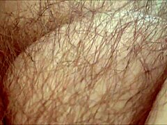 Horny amateur MILF rubs her hairy pussy in homemade masturbation session