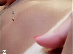 Athletic redhead shows tan lines in sensual video