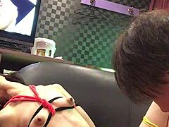 Miki humiliated and tied up on a hotel couch while streaming porn