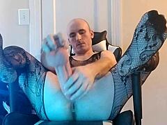 Dude, this sissy in fishnets is gaping her ass hardcore!