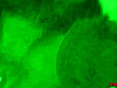 a blonde sucks off a tied-up guy in bdsm mask gear