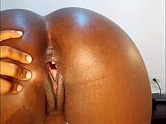 Big butt girl rides dildo then spreads pussy