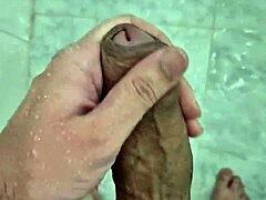 Young Brazilian guy jerks off in shower until he finishes. It's a steamy solo scene.