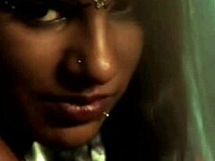 Hot Indian dancer performs solo by the fire