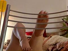 check out this hot milf teasing with big bare feet. her toes and soles drive foot fetish fans wild!