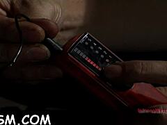 Lovable brunette darling is sitting on her huge fake penis