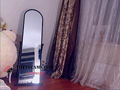 Dark-haired stunner slams it hard on cam with big tits.