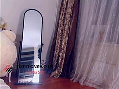 Dark-haired stunner slams it hard on cam with big tits.