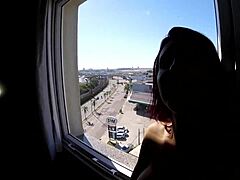 Naked Woman Poses At Hotel Window Near Airport