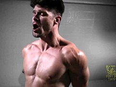 Intense rim chair action with bound gay stud under total control