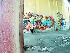 Chubby couple bangs hard against public street wall.