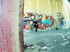 Chubby couple bangs hard against public street wall.