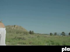 Perfect brunette Alexandra Tyler exposes nice boobs in outdoor shoot