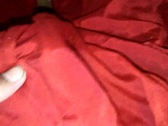 Horny Indian bisexual shemale masturbates in red silk satin