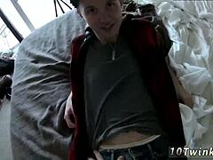 Emo teen boy engages in bareback gay sex with young partner, capturing cum on cock in video