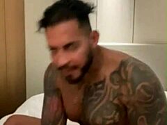 Tatued Viktor Rom with huge cock teases in bathroom striptease