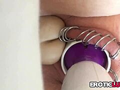 Hot girl with pierced vagina using sex toys for pleasure
