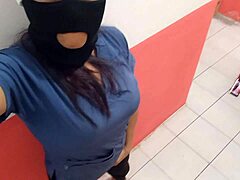 Milf nurse teases ass in hospital corridor