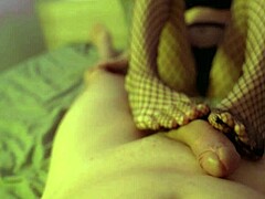 She jerked me with fishnet feet till I exploded
