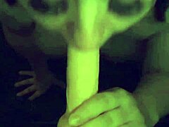 Sexy woman sucks on big dildo