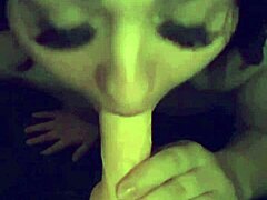 Sexy woman sucks on big dildo