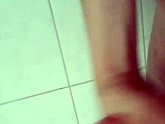 Bisexual solo play heats up in bathroom