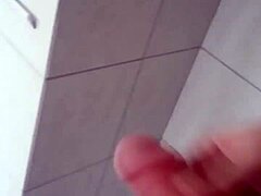 Bisexual solo play heats up in bathroom