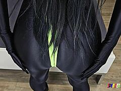 spandexqueen cums hard in black suit and jerks him off!