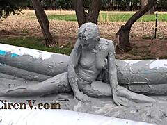 Ciren V gets messy with clay sploshing in pool.