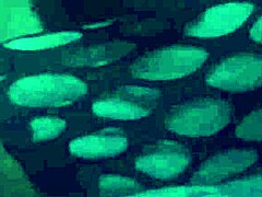 Sexy woman gives detailed footjob using nylons and leggings on cock