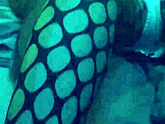 Sexy woman gives detailed footjob using nylons and leggings on cock