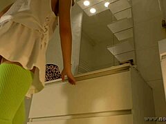 what's under that mini tennis skirt? hot brunette coed teases in bathroom with knee-high socks. no panties dare!
