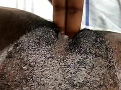 Look at this homemade ebony babe playing with her wet pussy!