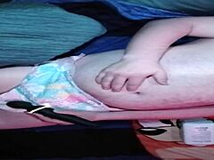 Baby pup prepares with diaper padding in this promo.