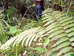 Fucking that black fat pussy bent over in the bush with big cock