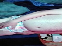 Baby pup prepares with diaper padding in this promo.