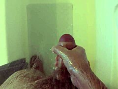 Masturbation at the shower turns into a steamy solo session