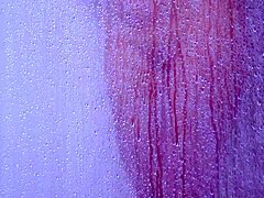 college tanned gorgeous girl feels relaxed taking a shower in her bikini