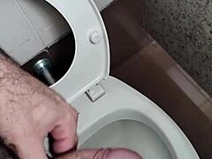 Public bathroom jerk-off session caught on cam, wow!