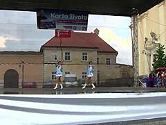 Two nice majorettes performing in their cheerleader outfits