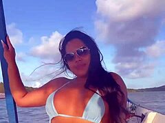 brazilian latina wife rides in bikini on boat