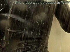 Latex Mistress Teases In Shower With Nylon And Leggings