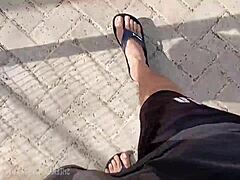 POV foot worship while she plays barefoot with intense focus. It’s a raw fetish moment.