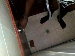Conversational Shower spy cam catches horny friend licking pussy in bathroom voyeur action