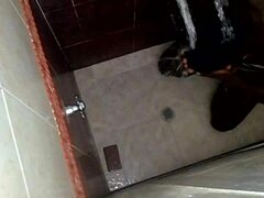 Conversational Shower spy cam catches horny friend licking pussy in bathroom voyeur action