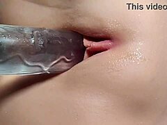 Bored Woman Fingers Her Hairless Pussy Close-Up