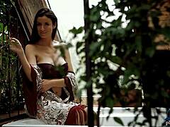 A busty milf strips and rips clothes in solo tease