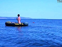 Mature woman in bikini on Volga River boat