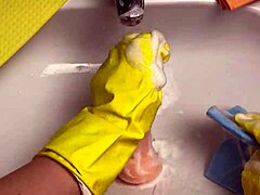 Hot housewife washes dildo after using it in her pussy!